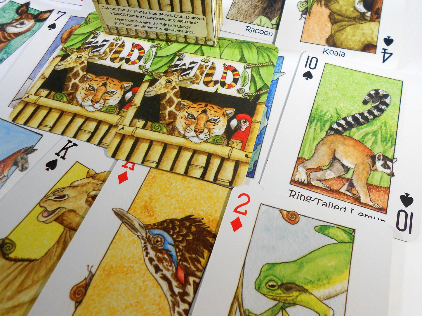 Wild! Deck of Playing Cards - Unique Seek-N-Find feature where you find hidden images in cards - Features artwork of animals by Peter Wood
