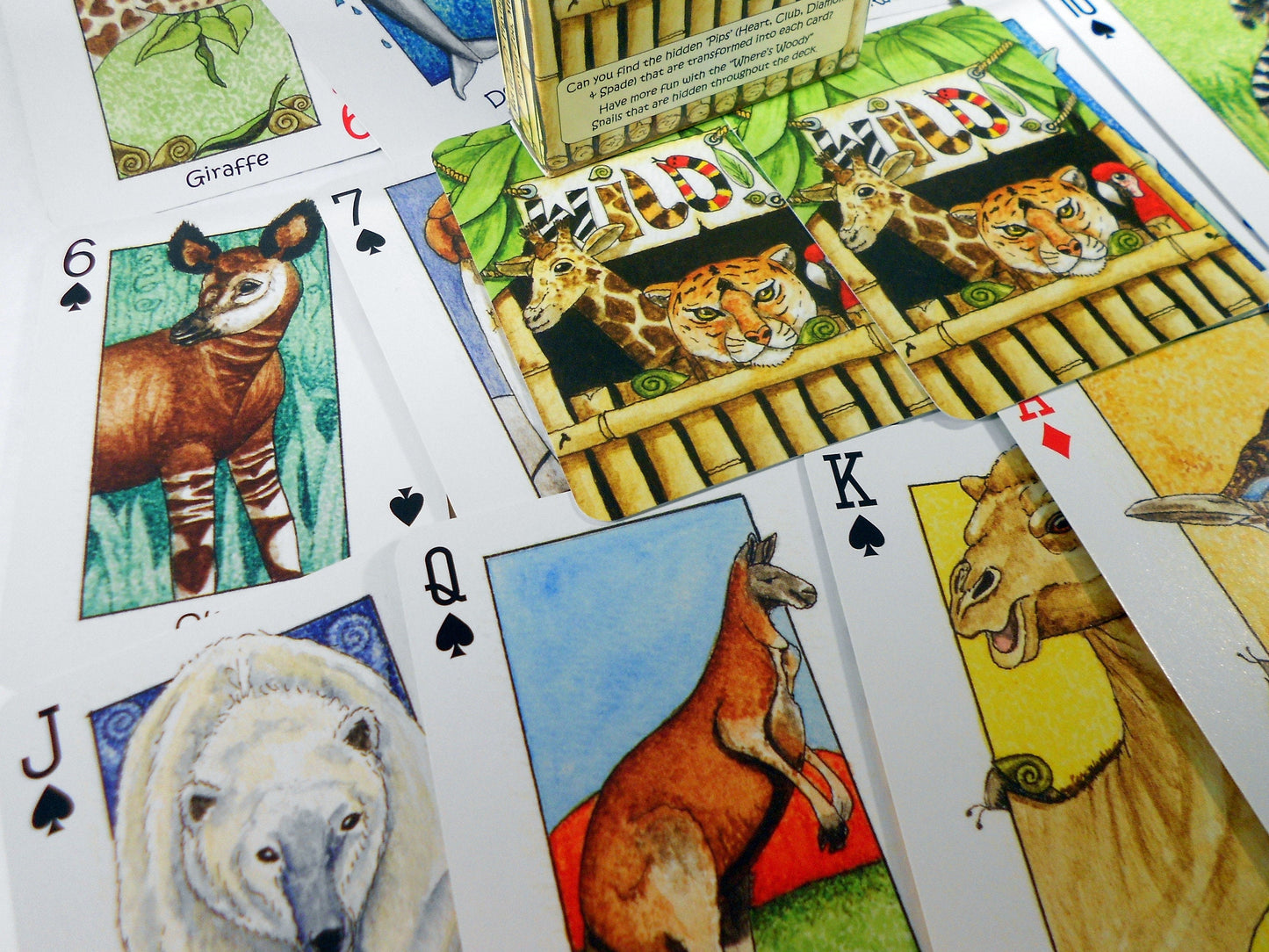 Wild! Deck of Playing Cards - Unique Seek-N-Find feature where you find hidden images in cards - Features artwork of animals by Peter Wood