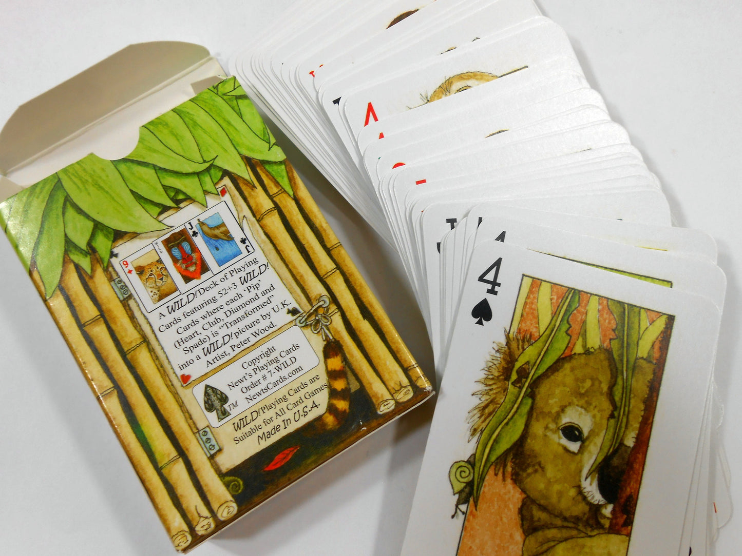 Wild! Deck of Playing Cards - Unique Seek-N-Find feature where you find hidden images in cards - Features artwork of animals by Peter Wood