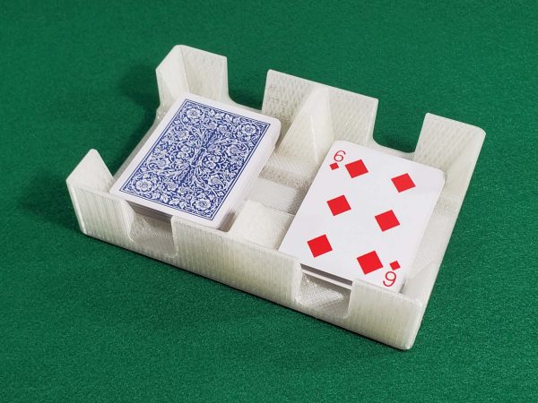 Crystal clear card tray showing deck of cards