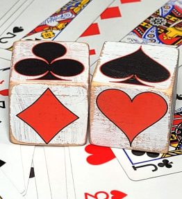 Distressed trump markers on playing cards
