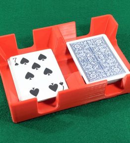 Deck of playing cards in red tray or caddy