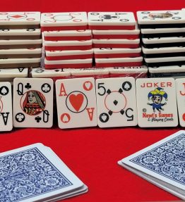 Hand holding 4 poker playing card tiles